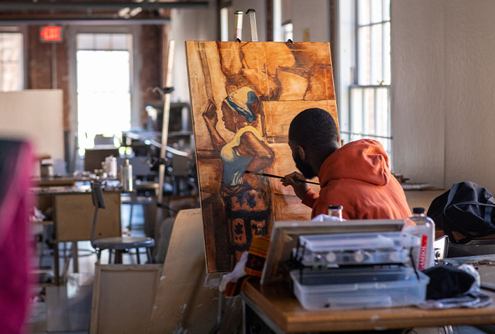 Student painting. Links to Gifts That Pay You Income